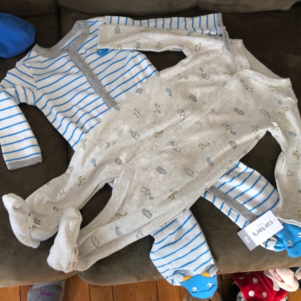 Two pairs 9m Carters pjs brand new with tags